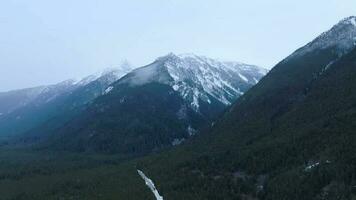 Aerial view of winter rocky mountains in gloomy day. Chilliwack video