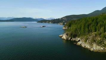 Aerial view of the coastal line in Lighthouse Park West Vancouver video