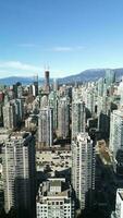 Vertical video. Aerial view of the skyscrapers in Downtown of Vancouver, Canada video