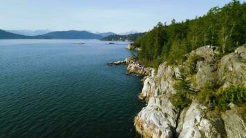 Aerial view of the coastal line in Lighthouse Park West Vancouver video