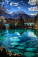 body of water with a mountain in the background. . photo