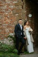 portrait of a young couple of bride and groom on their wedding day photo