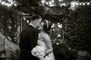 portrait of a young couple of bride and groom on their wedding day photo