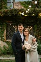 portrait of a young couple of bride and groom on their wedding day photo