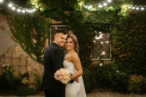 portrait of a young couple of bride and groom on their wedding day photo