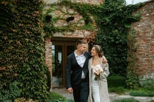 portrait of a young couple of bride and groom on their wedding day photo