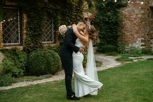 portrait of a young couple of bride and groom on their wedding day photo