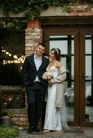 portrait of a young couple of bride and groom on their wedding day photo