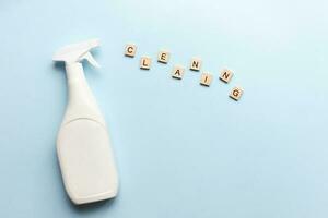 Flat lay cleaner word cleaning from wooden letters. clean up photo