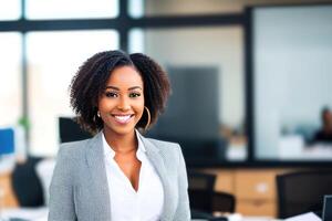 Young smiling businesswoman, standing in blur background of office. photo