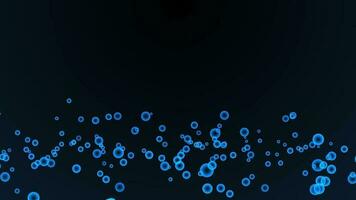 blauw glas bal icoon deeltjes stuiteren naar de grond Aan zwart achtergrond. video