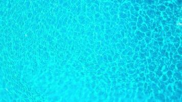 Blue water in the swimming pool with light reflections. video