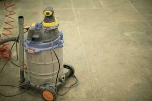 Vacuum cleaner for washing room. Water tool for cleaning. photo