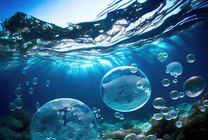 Blue glossy water bubble in underwater background. Nature and abstract concept. photo