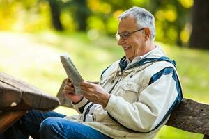 A senior man in the park photo