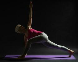 A woman doing physical exercises photo