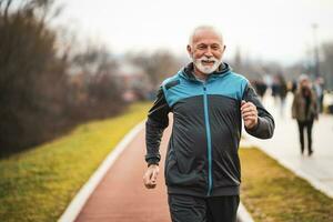 A senior man doing physical exercises photo