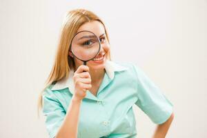 A nurse with a loupe photo