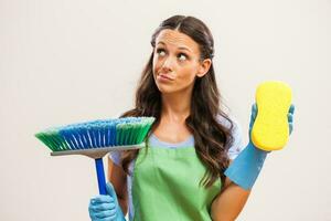 A woman who is going to clean the house photo