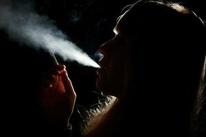 A woman smoking photo