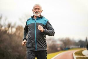 A senior man doing physical exercises photo