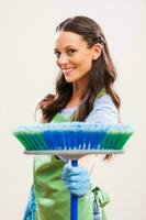 A woman who is going to clean the house photo