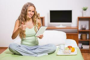 A woman in her bedroom photo