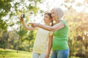 A grandmother spending time with her granddaughter photo