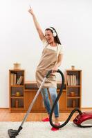 A woman cleaning the house photo