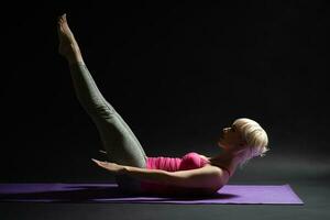 A woman doing physical exercises photo