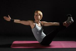 A woman doing exercises photo