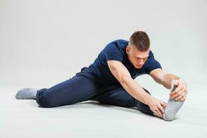 A man doing physical exercises photo