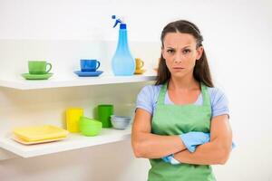 A woman cleaning the house photo