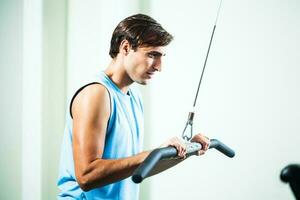 A man doing physical exercises photo