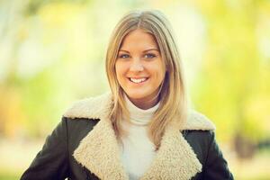 A happy woman in the park photo