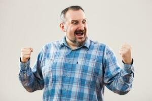 Portrait of a man with blue plaid shirt photo