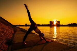 A woman doing physical exercises photo