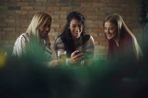 Friends having fun at the bar photo