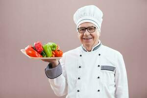 retrato de un mayor cocinero foto