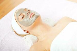 A woman having a facial treatment photo