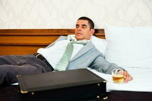 A businessman in a hotel room photo