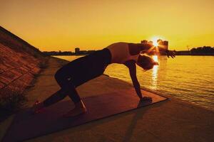 A woman doing physical exercises photo