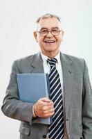 Portrait of a senior businessman holding a folder photo