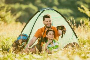 Father and son camping photo