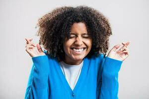 Portrait of Afro woman with a blue cardigan photo