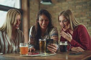 Friends having fun at the bar photo