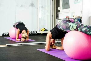 A woman doing physical exercises photo