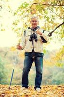 A senior man hiking photo