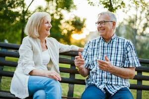 A senior couple spending time together in the park photo