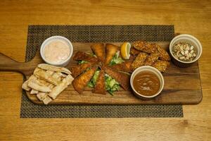 Baba ghanoush meal on wooden board. photo